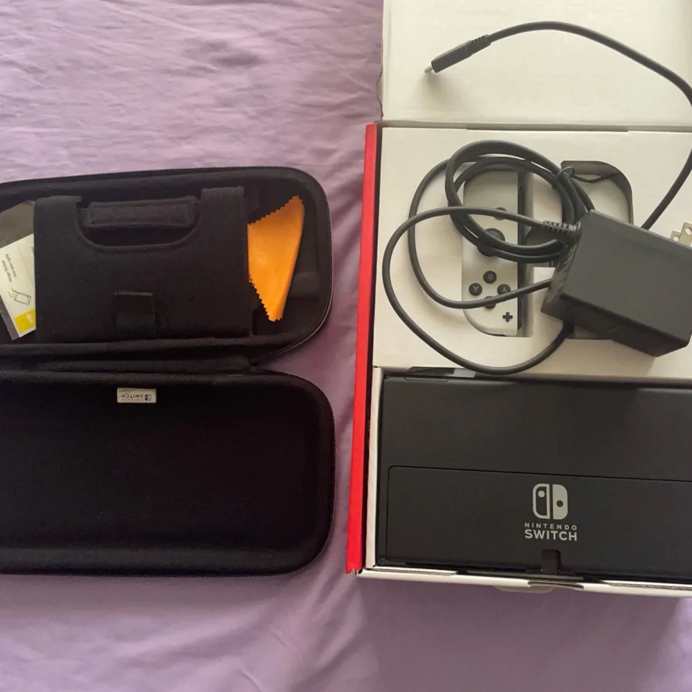 Nintendo Switch with Gray Joy-Con and Accessories